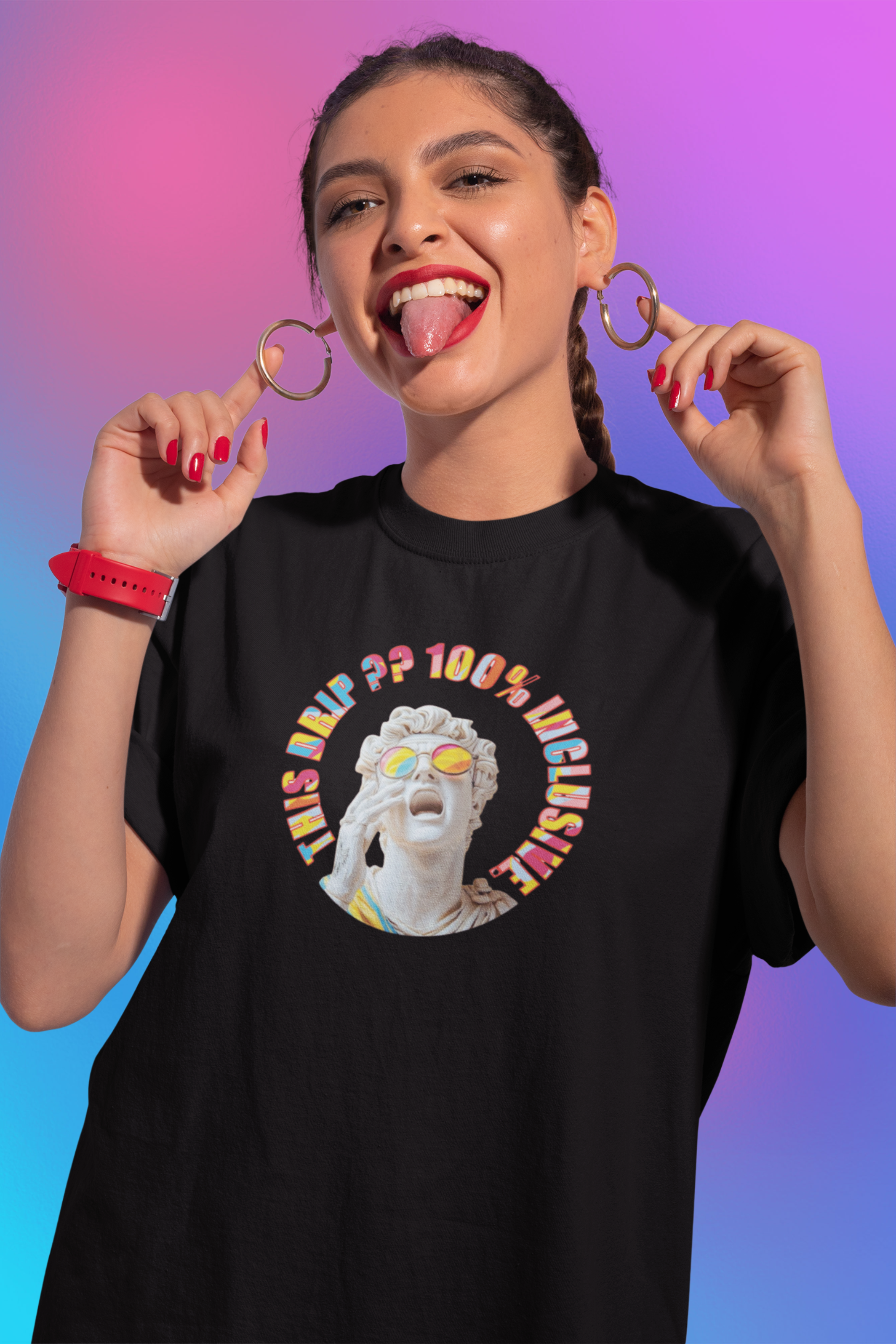 Person wearing a black unisex t-shirt with a bold graphic of a Greco-Roman statue in rainbow sunglasses, surrounded by the vibrant text "This Drip?? 100% Inclusive" — representing LGBTQIA+ pride and gender-fluid streetwear style.