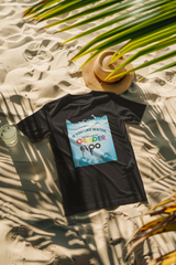 Black t-shirt styled in a sunny beach setting with bold gender-affirming text "If you like water, you will like my gender too"; ANTI’s unapologetic approach to queer and trans visibility.

