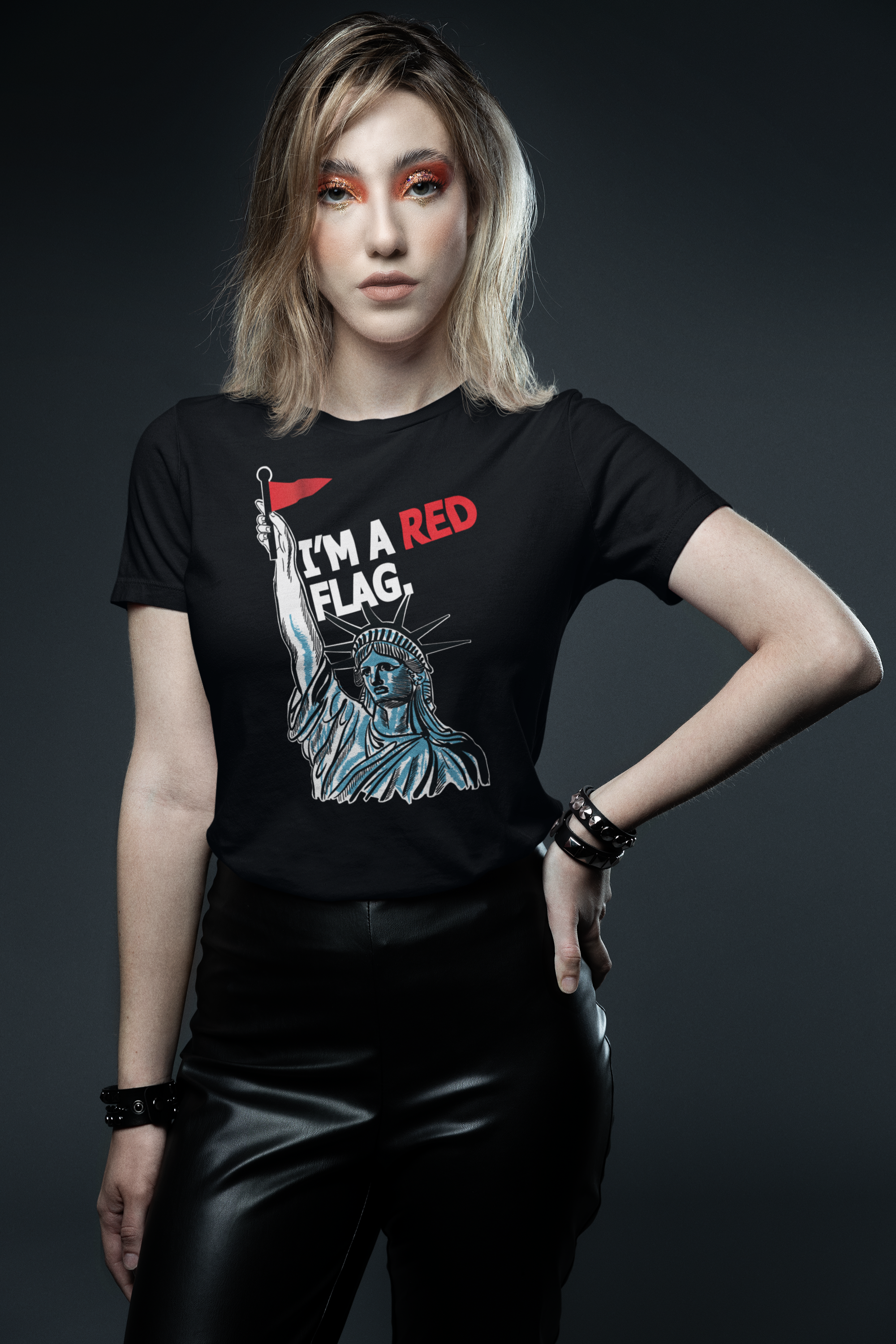 Bold unisex black t-shirt with white “I’M A RED FLAG” statement graphic centered on the chest, designed by ANTI, a queer-inclusive fashion brand embracing gender-fluid streetwear aesthetics.