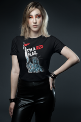 Bold unisex black t-shirt with white “I’M A RED FLAG” statement graphic centered on the chest, designed by ANTI, a queer-inclusive fashion brand embracing gender-fluid streetwear aesthetics.