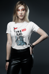 Unisex white t-shirt featuring a bold red “I’M A RED FLAG” print across the front, part of ANTI’s LGBTQIA+ affirming streetwear line championing identity, defiance, and pride.

