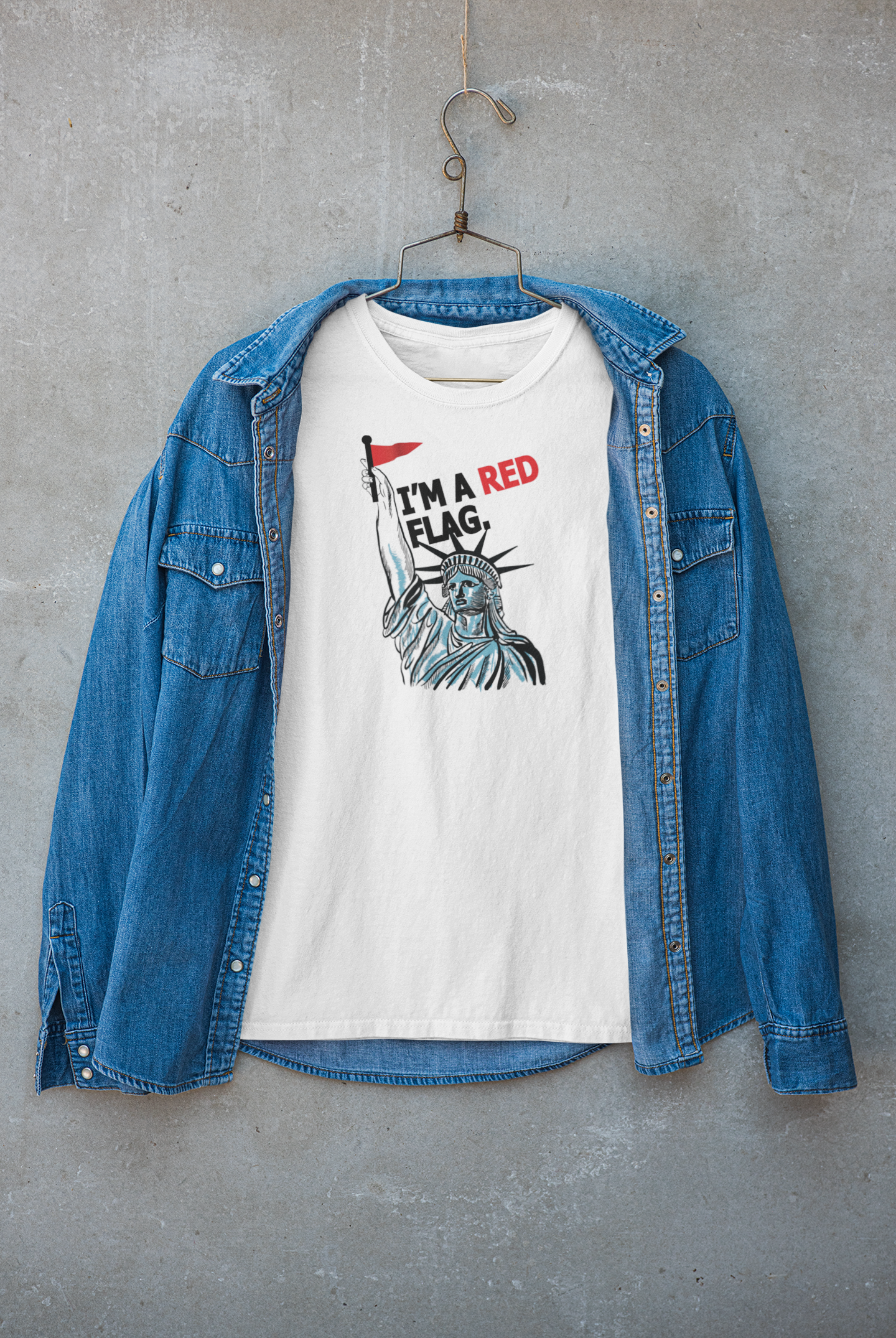 White gender-neutral “I’M A RED FLAG” graphic tee layered under a light jacket, capturing ANTI’s rebellious streetwear edge and queer-inclusive fashion ethos.

