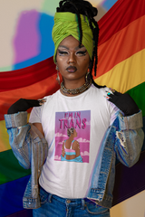 White unisex t-shirt with striking black "I’M IN TRANS" print, worn by a non-binary model; minimalist queer fashion promoting trans empowerment, from inclusive brand ANTI.