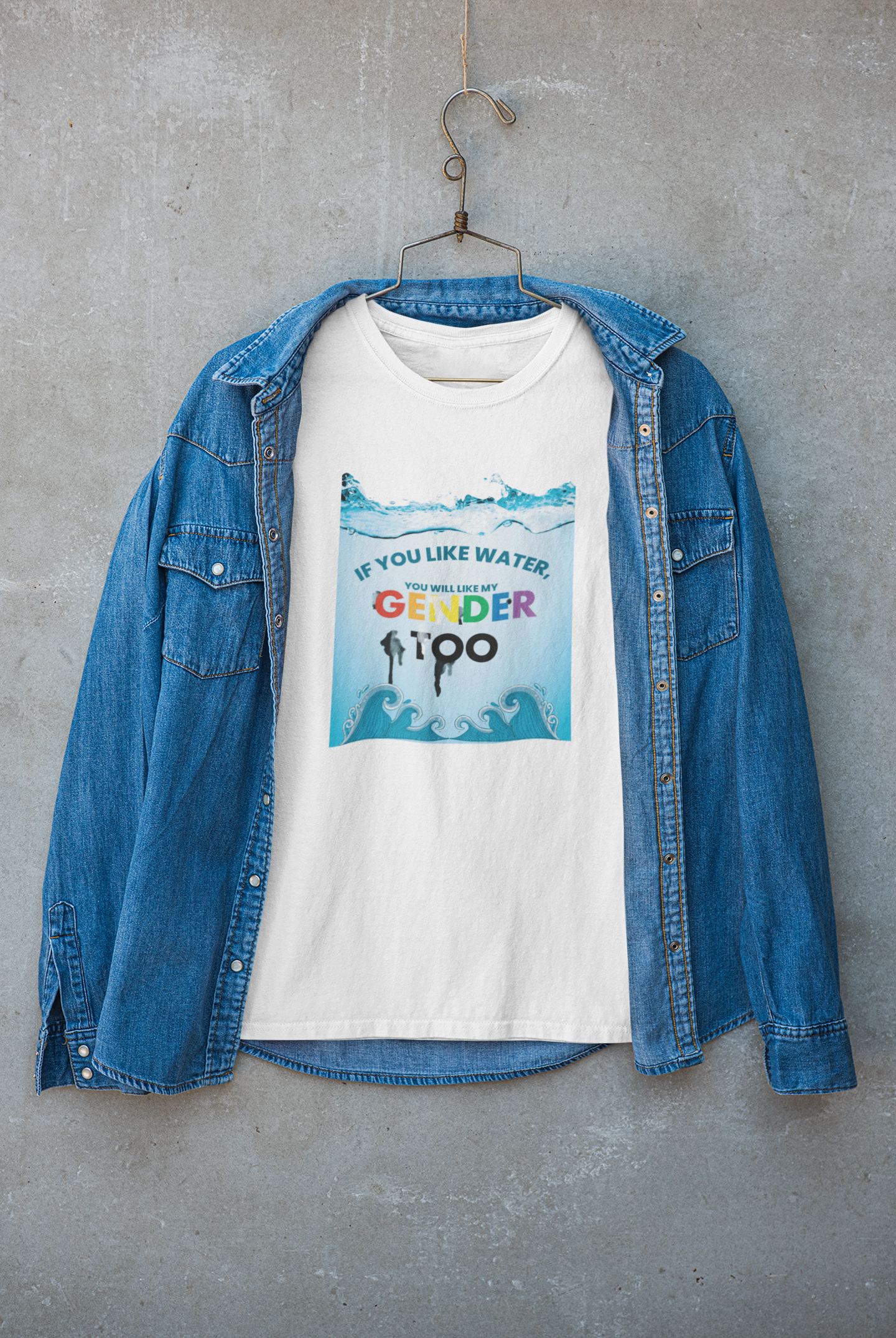White t-shirt under a stylish jacket, showing the inclusive slogan "If you like water, you will like my gender too," captured in a layered streetwear outfit; designed by ANTI for everyday gender liberation.