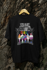 Gender-fluid model wearing the ANTI “Straight Outta Closet” black t-shirt hanging on a treet; the look is styled with edgy, urban streetwear flair, empowering LGBTQIA+ visibility and queer expression.