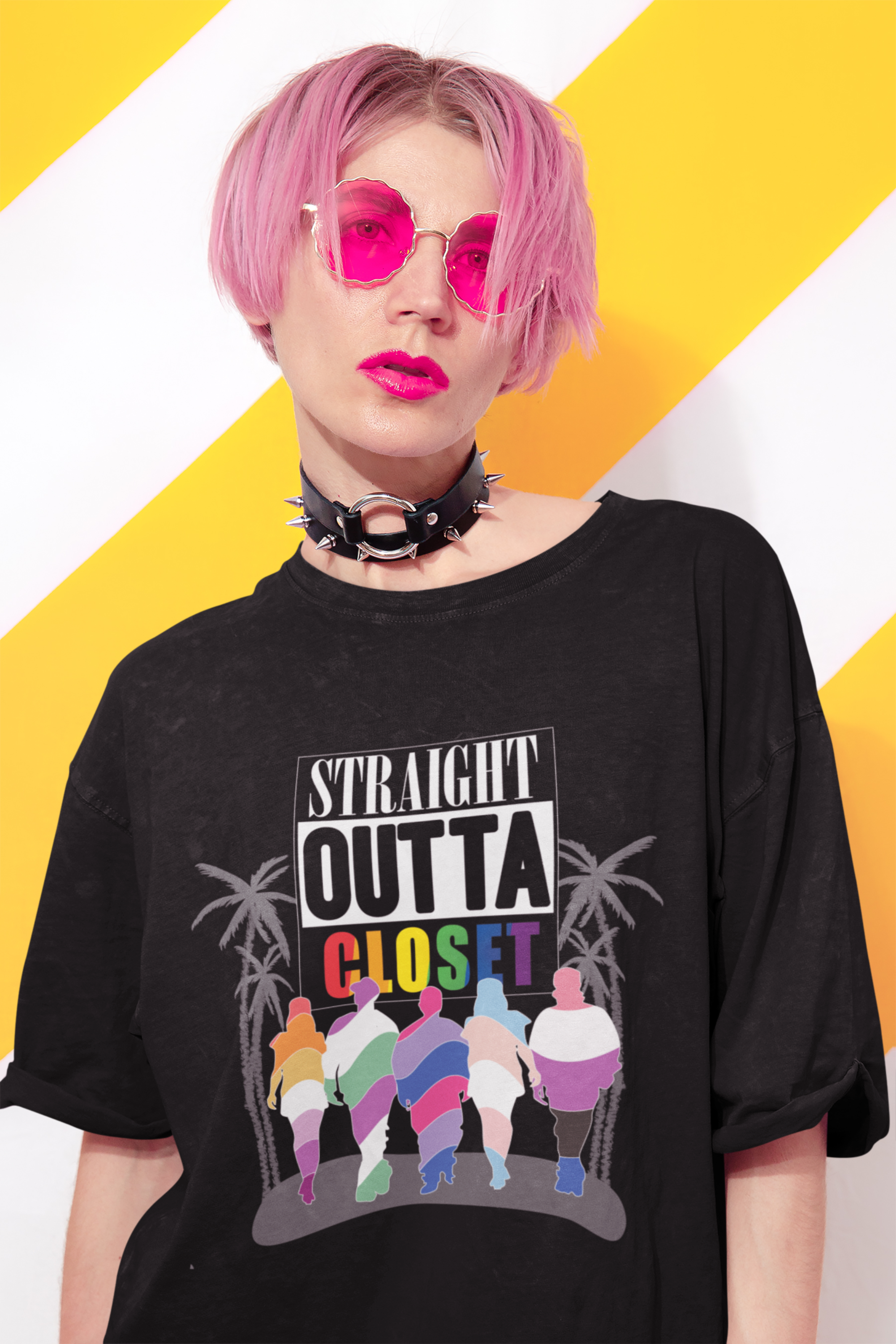 Person confidently styled in the oversized ANTI “Straight Outta Closet” black t-shirt, standing with pride and attitude, inclusive fit that makes a statement for queer liberation and fashion rebellion.