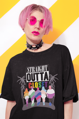Person confidently styled in the oversized ANTI “Straight Outta Closet” black t-shirt, standing with pride and attitude, inclusive fit that makes a statement for queer liberation and fashion rebellion.