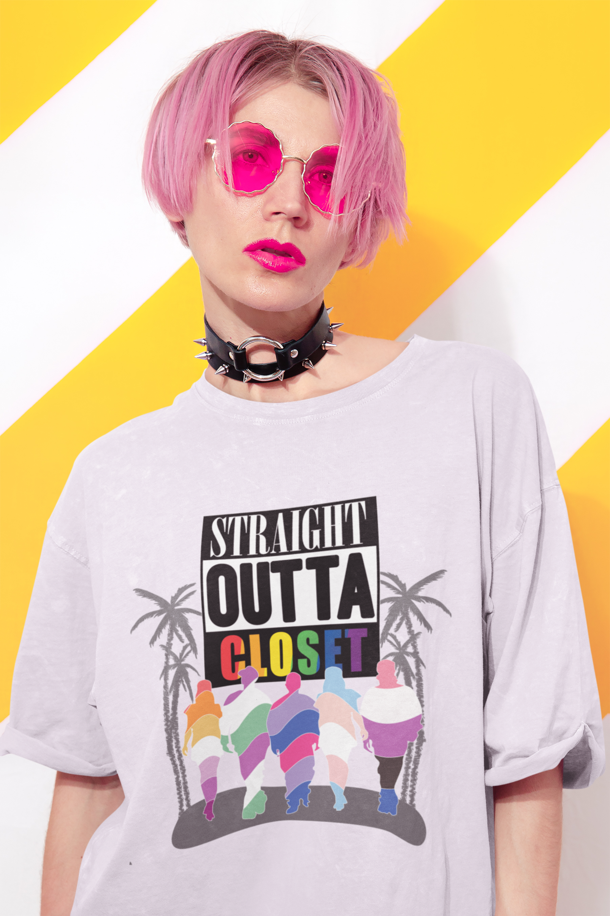 Person standing confidently in the oversized ANTI “Straight Outta Closet” white t-shirt, styled for powerful gender-fluid fashion; clean design, radical message, and unapologetic LGBTQIA+ pride.