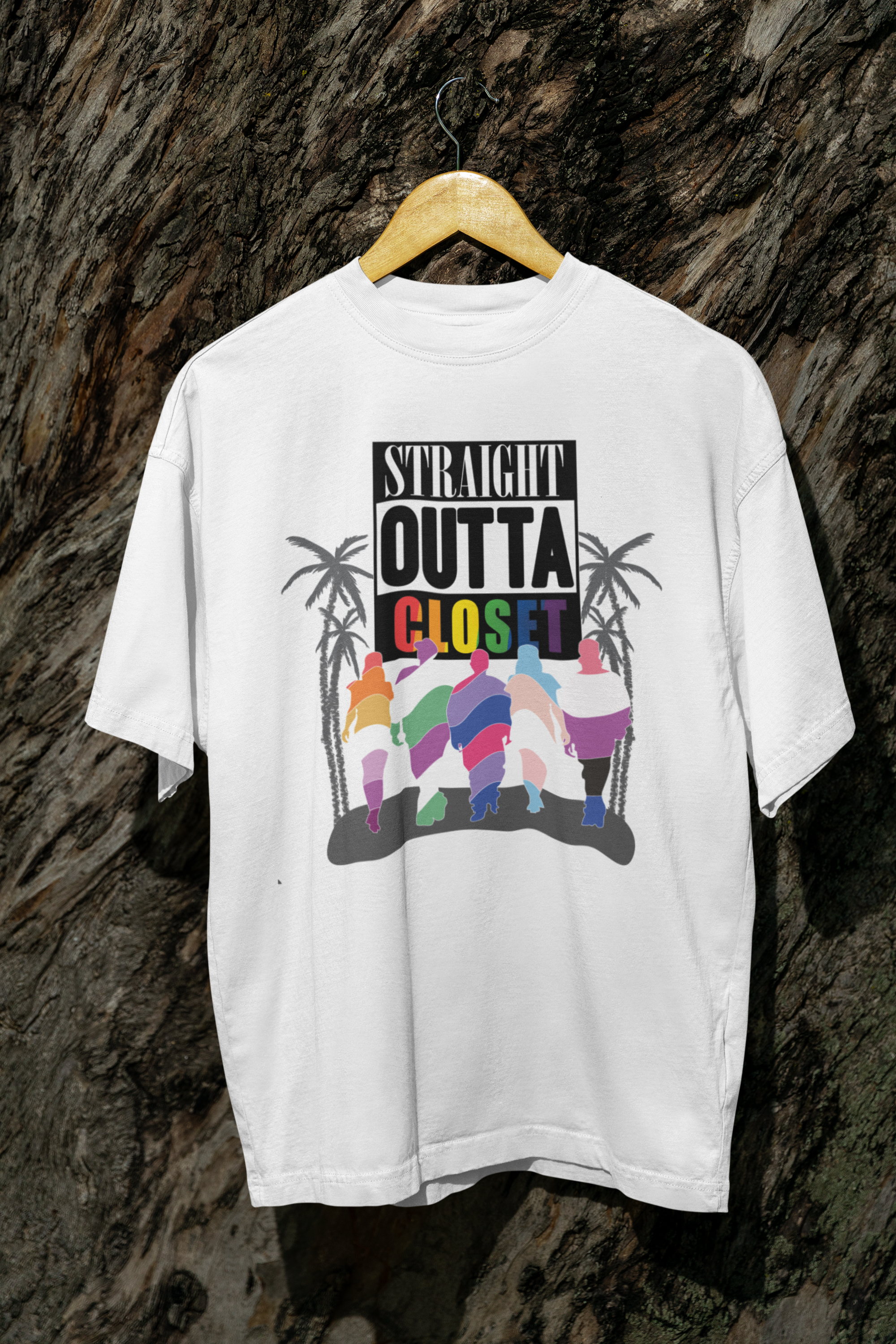 Gender-expansive model Hanging, ANTI “Straight Outta Closet” white t-shirt you can styled for fearless queer fashion; bold, inclusive, and unapologetically proud.