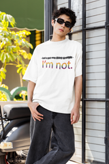 "Model in ANTI’s white oversized ‘I’m NOT’ shirt – gender-fluid, pride-affirming style for unapologetic self-expression."

