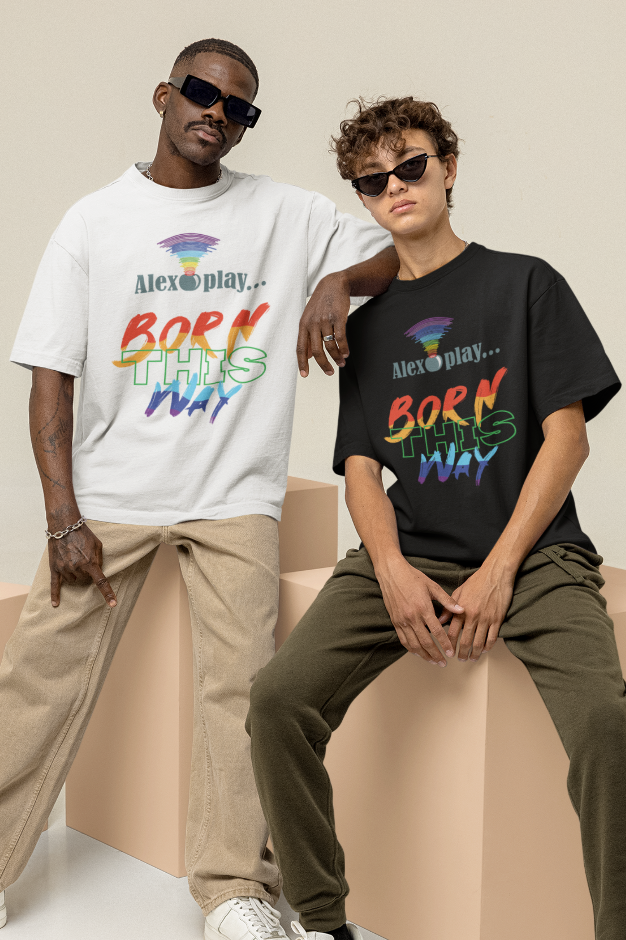 The model stands facing forward in the “Alexa, Play Born This Way” tee, allowing the minimalist yet powerful design to command attention. The shirt’s fit is intentionally ungendered, pairing effortlessly with any identity or expression. The model’s relaxed stance and minimal background keep the focus on visibility, pride, and ANTI’s mission of challenging fashion norms.