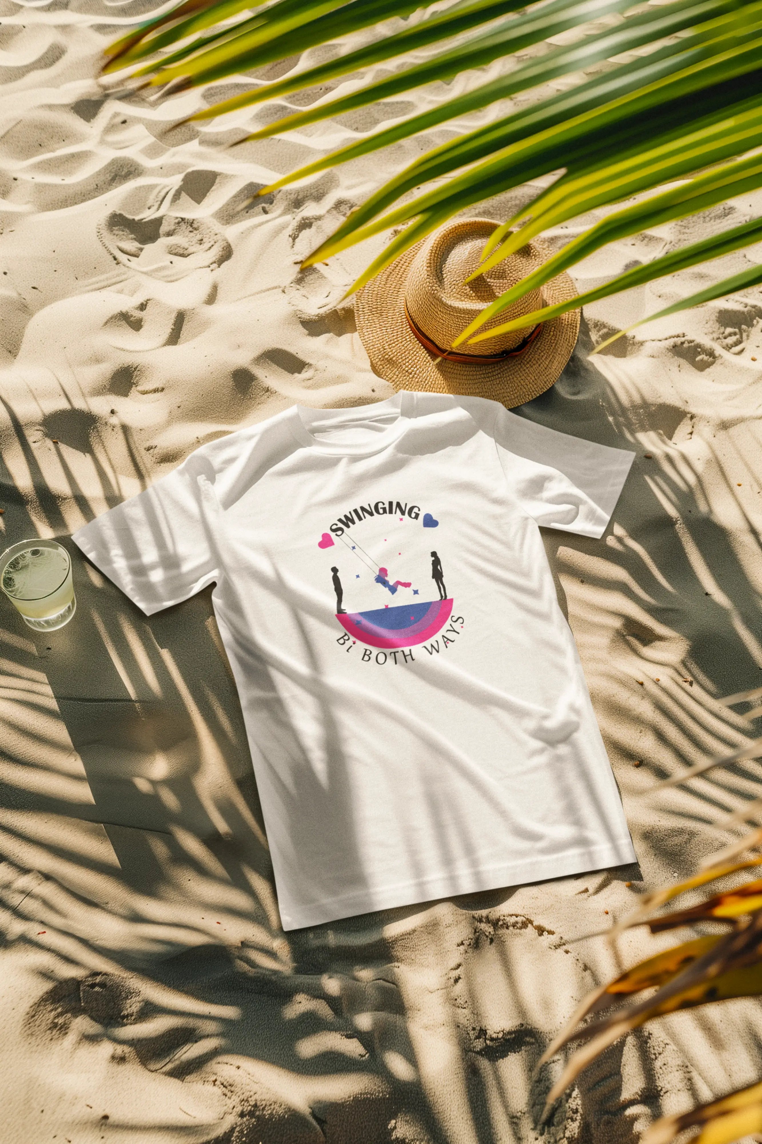 Unisex white t-shirt featuring “SWINGING Bi BOTH WAYS” worn at the beach; promotes bisexual pride and gender inclusivity through fun and empowering fashion.