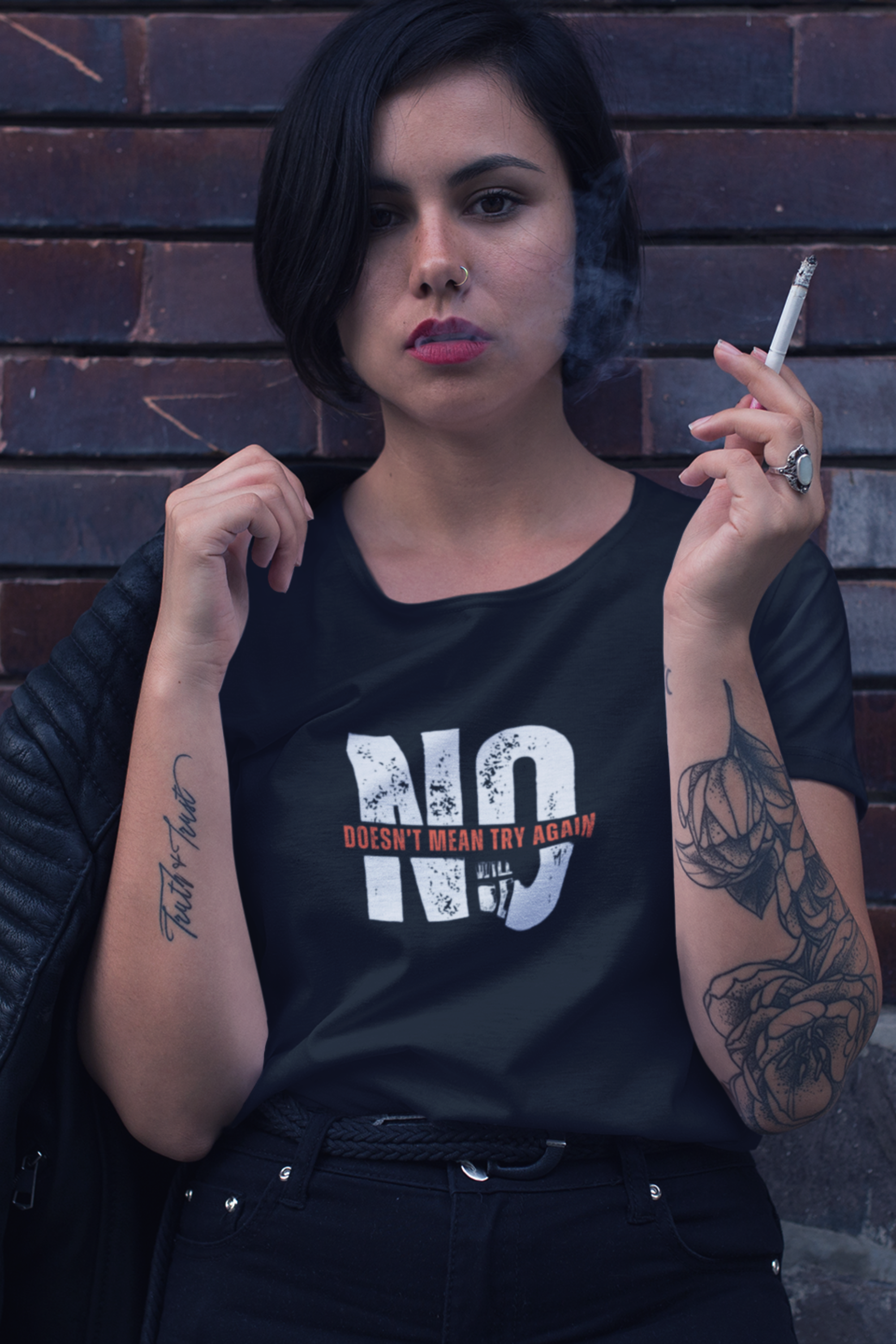 Black graphic T-shirt featuring bold "NO DOESN'T MEAN TRY AGAIN" statement in white text, edgy urban streetwear for men and women, empowering slogan tee.