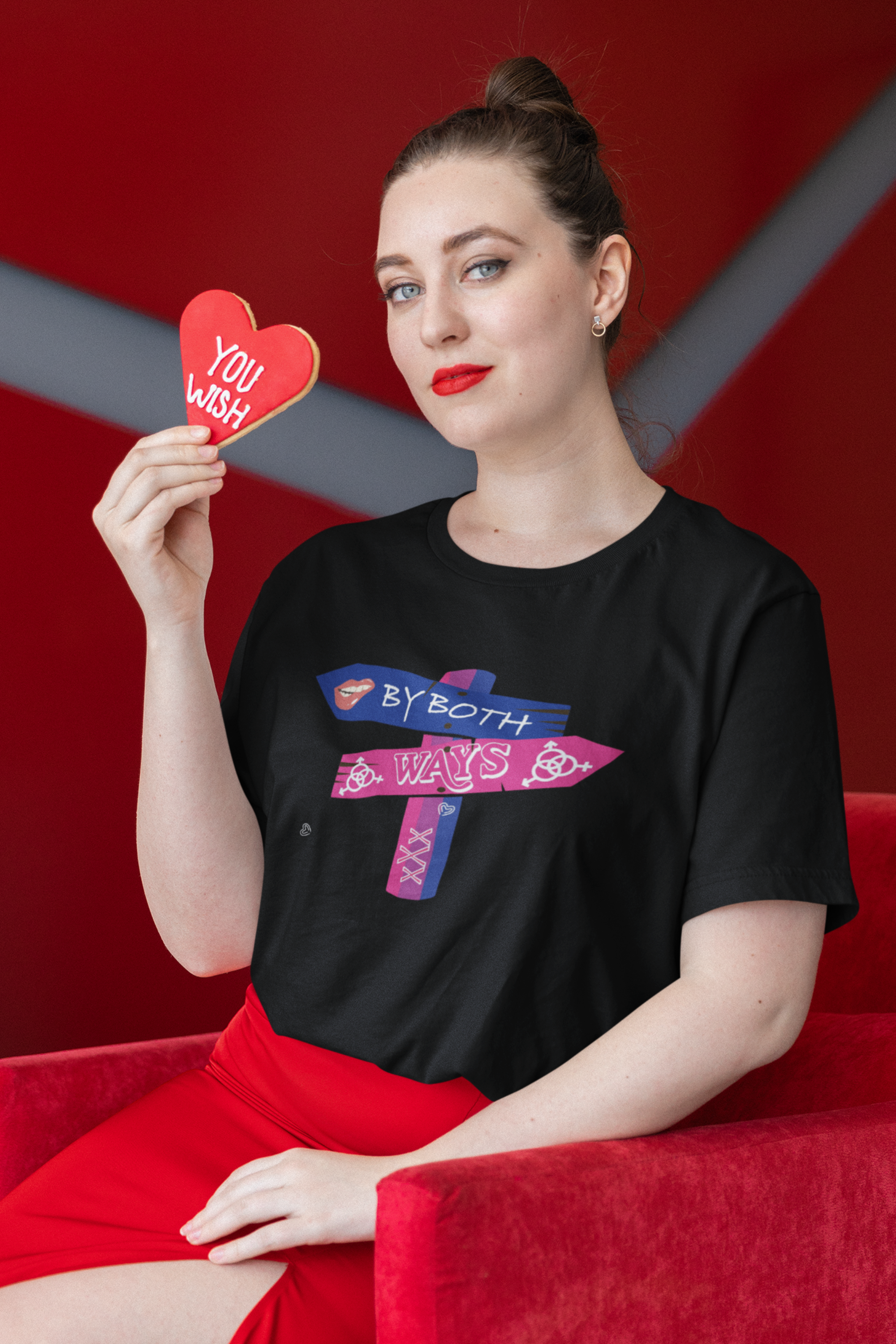 Model wearing black oversized gender-fluid T-shirt with “By Both Ways” text, styled for bold queer street fashion