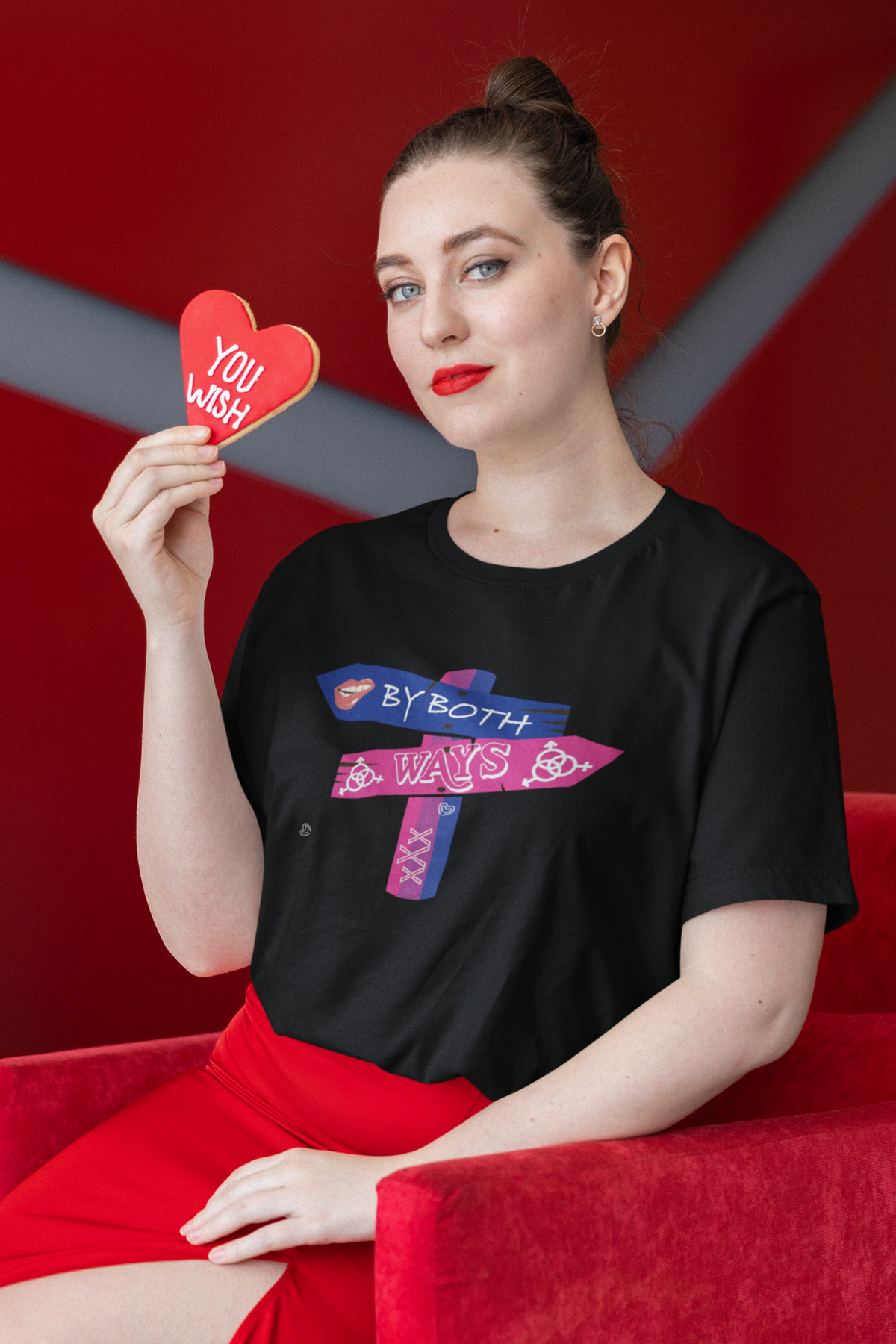 Model wearing black oversized gender-fluid T-shirt with “By Both Ways” text, styled for bold queer street fashion