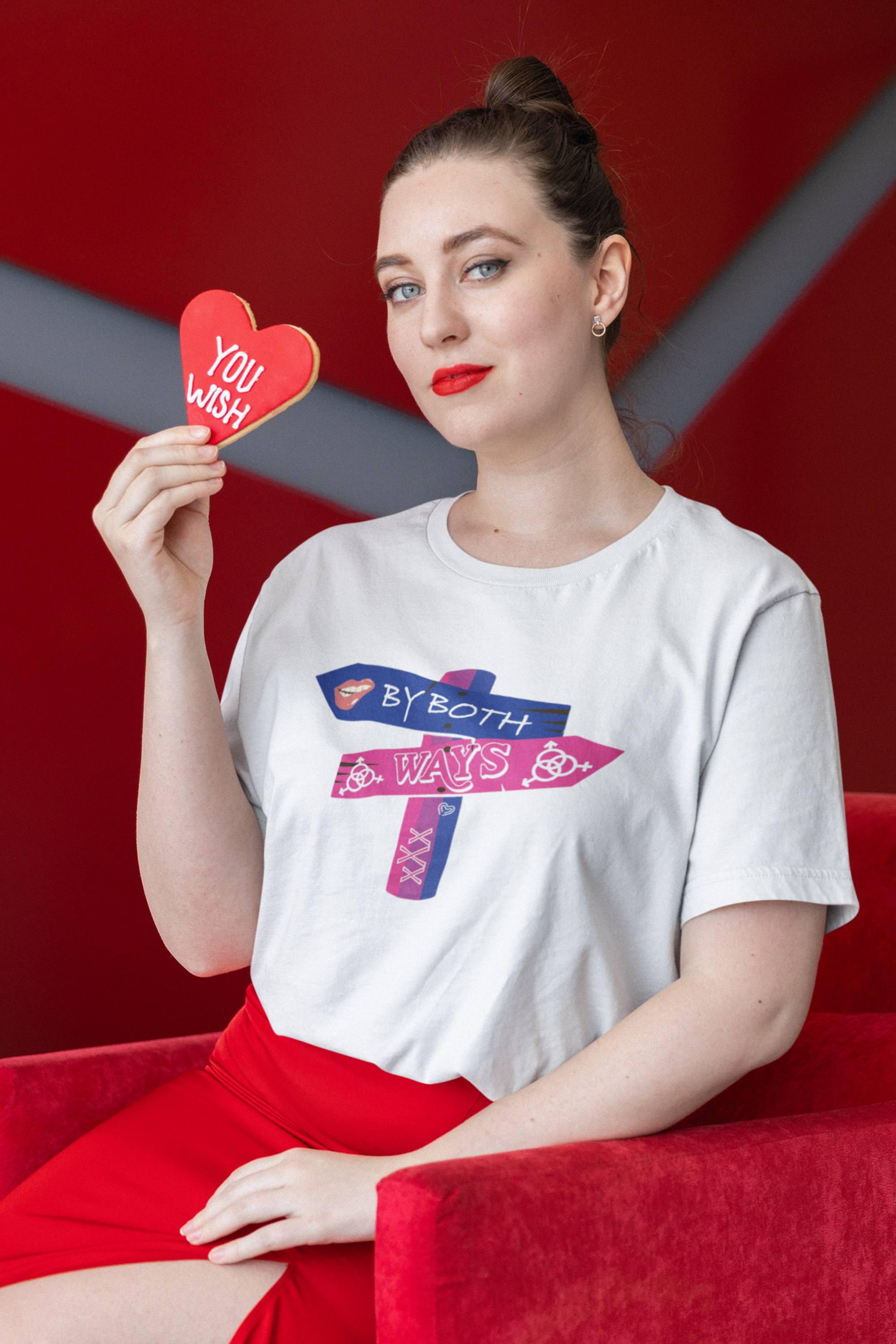 Model wearing oversized white “By Both Ways” T-shirt in a gender-expansive fit, styled for confident queer identity

