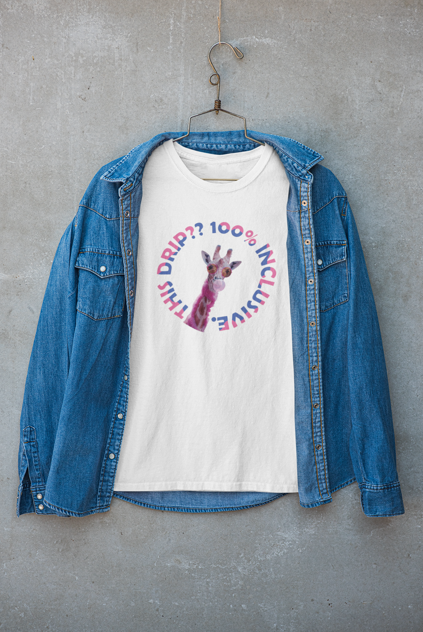 White unisex streetwear T-shirt featuring bold black text that reads "THIS DRIP IS 100% INCLUSIVE" and a minimalist giraffe graphic —inclusive fashion statement tee promoting diversity and equality.