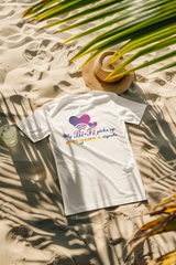 Model standing on the beach in a white pride-themed T-shirt that reads “My Bi-Fi Picks Up Everyone’s Signal,” styled as gender-fluid beachwear embracing bisexual visibility and summer pride aesthetics.

