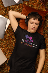 Model wearing a black unisex T-shirt with the bold slogan “My Bi-Fi Picks Up Everyone’s Signal” in vibrant, pride-themed lettering. A gender-inclusive, body-positive fashion piece celebrating bisexual identity and LGBTQIA+ visibility.