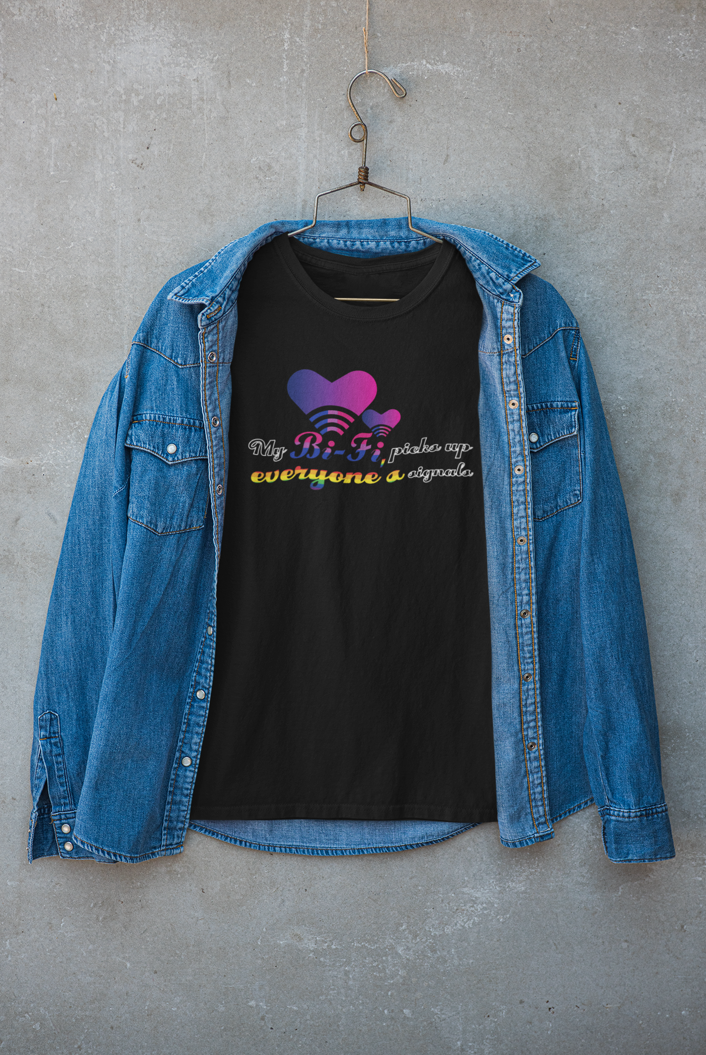 Model wearing a black “My Bi-Fi Picks Up Everyone’s Signal” T-shirt under a sleek jacket, representing fluid, gender-inclusive queer street style and self-expression.
