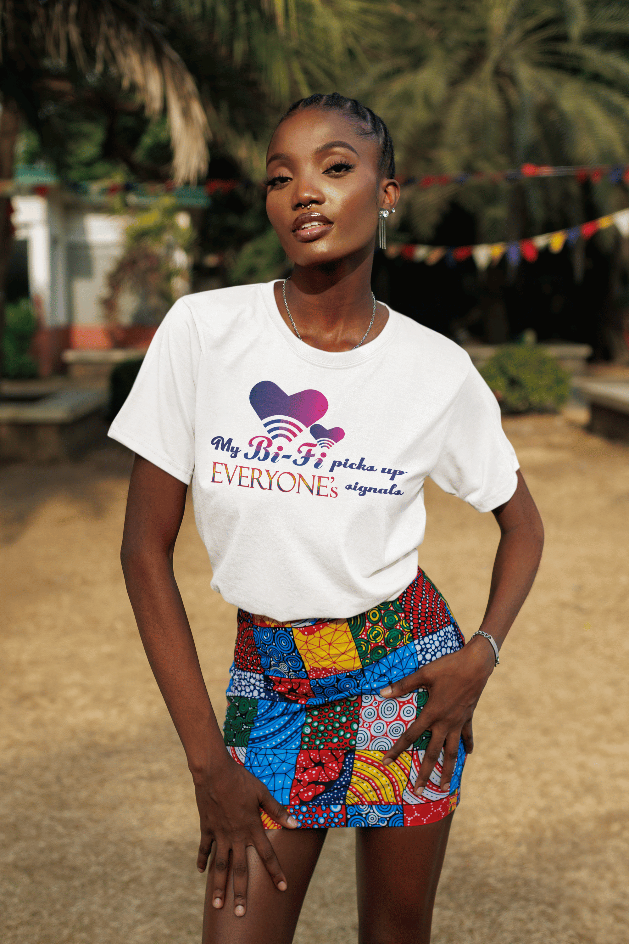 Model in oversized white “My Bi-fi picks up everyone's signal” tee, styled with edge and LGBTQIA+ pride for everyday wear.