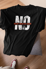 Black unisex t-shirt on stool with “No doesn’t mean try again” print, cotton oversized fit, queer fashion staple