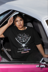 Make a statement without saying a word. This bold black oversized t-shirt features the empowering message “Unapologetically Fierce, Fabulously Female” in striking white text. Designed for those who lead with attitude and style, it's captured here on a confident femme-presenting model inside a car—driving her own narrative. Perfect for pairing with denim, leather, or anything rebellious.