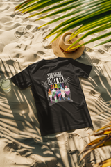 Model wearing a black “Straight Outta Closet” t-shirt on the beach, representing LGBTQ+ pride with bold statement style.