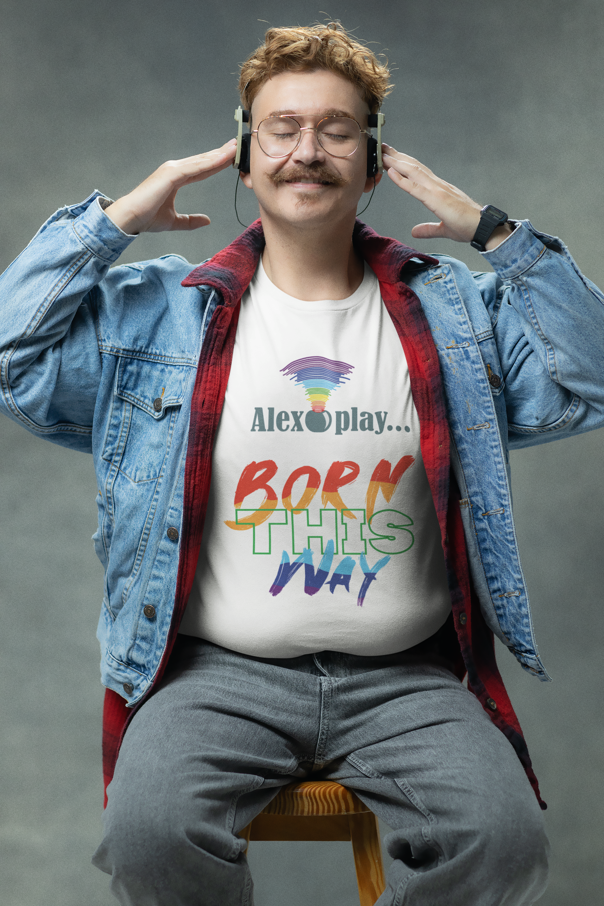 Model in white UNISEX “Alexa, play Born This Way” tee serving confident, gender-inclusive fashion energy.