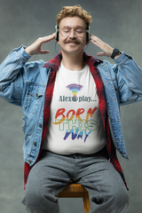 Model in white UNISEX “Alexa, play Born This Way” tee serving confident, gender-inclusive fashion energy.