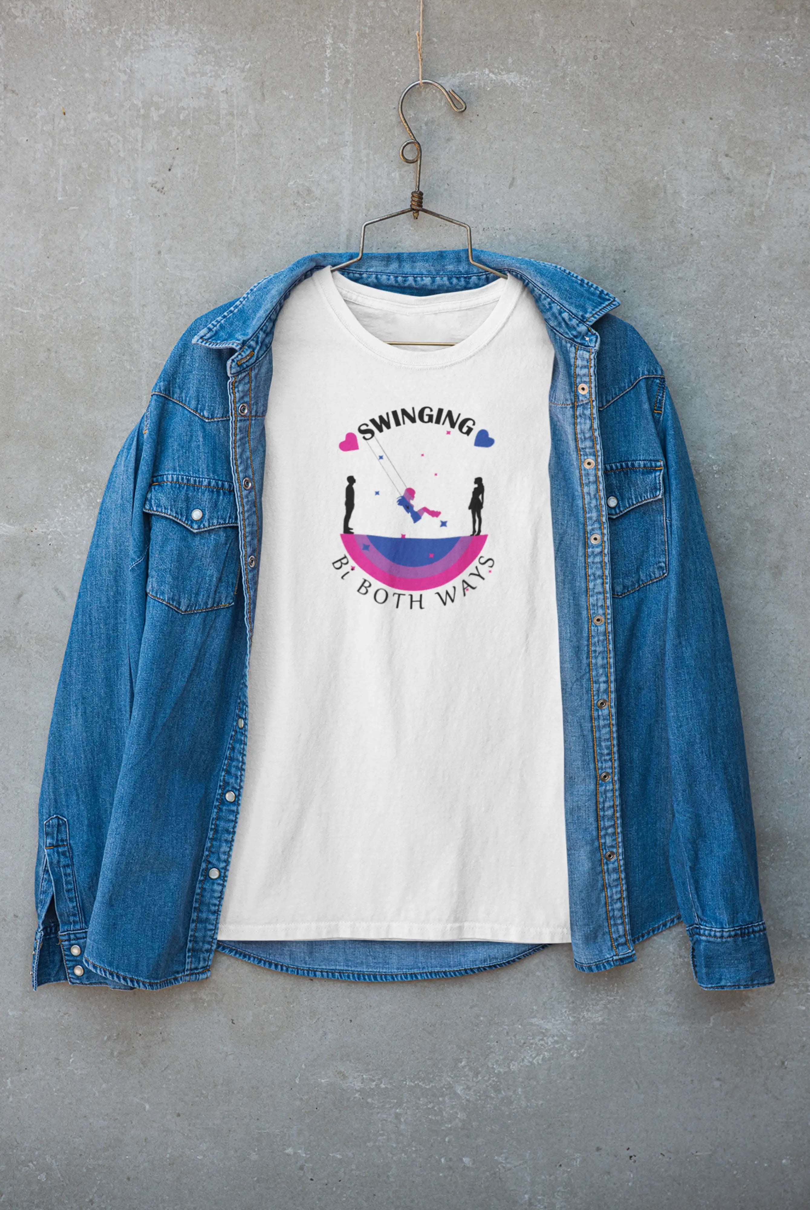 White gender-neutral t-shirt with “SWINGING Bi BOTH WAYS” design layered under a jacket; a stylish bisexual visibility statement perfect for street-style lovers and LGBTQIA+ allies.

