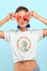White inclusive t-shirt showcasing a unique graphic of a man with glasses and the empowering slogan “This Drip Is 100% Inclusive”; perfect for diverse, body-positive fashion statements.