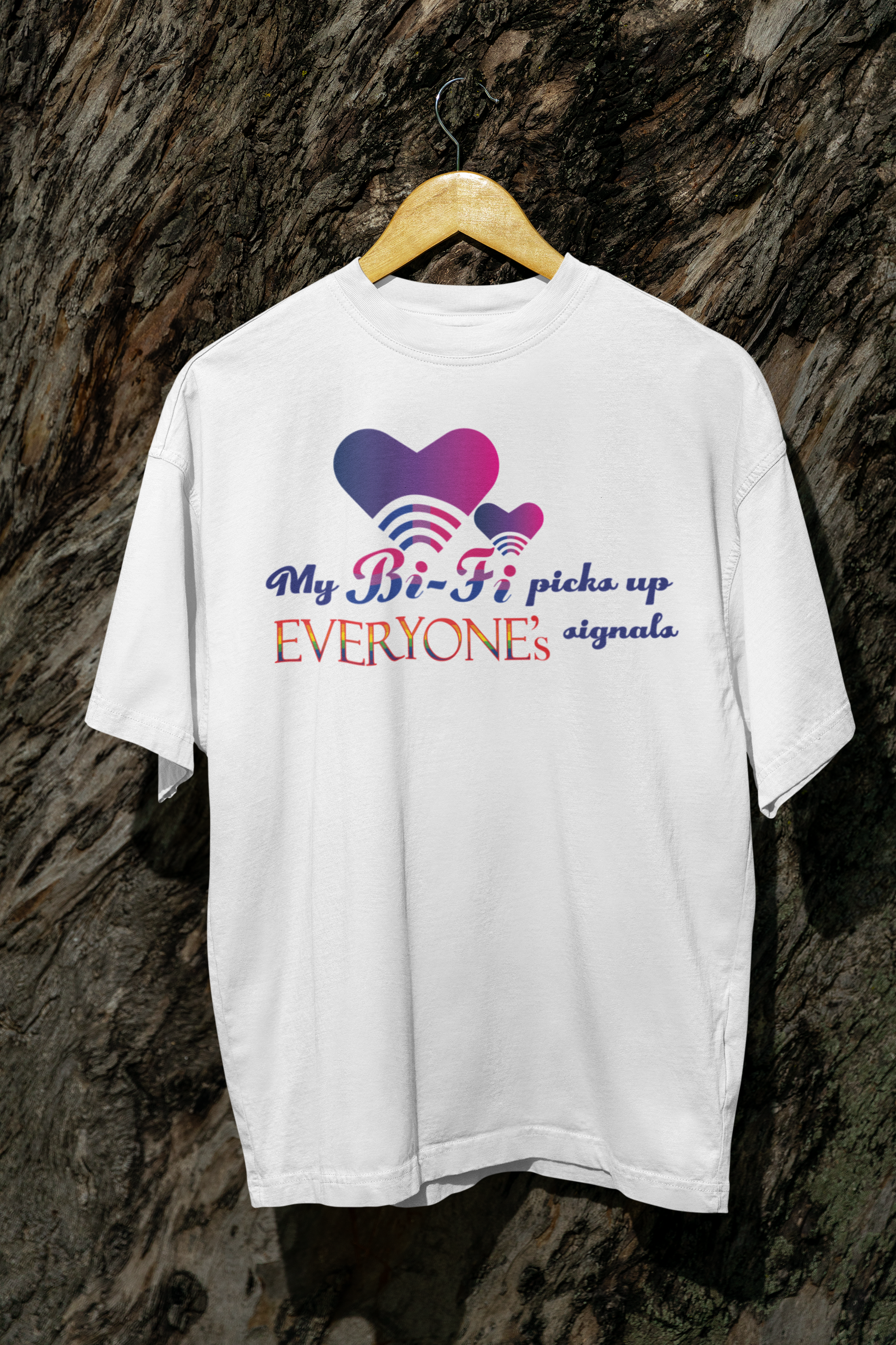 White oversized My Bi-fi T-shirt hanging, featuring bold bi+ slogan graphic and relaxed, gender-fluid fit.