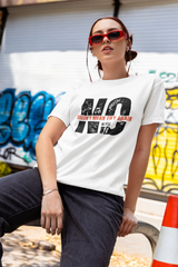White feminist slogan tee on queer femme model, oversized fit, inclusive and rebellious, styled with edge and ease
