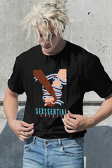 “Black unisex T-shirt by ANTI, featuring the iconic ‘Sexssential Crisis _ 2 Hands’ graphic design. Photographed in a coastal setting for a relaxed, edgy beach streetwear vibe.”
