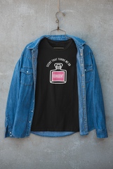 "Black T-shirt designed for urban layering, featuring bold text 'Scent That Turns Me On' – sleek streetwear with attitude."

